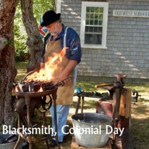 an image of a blacksmith on Colonial Day